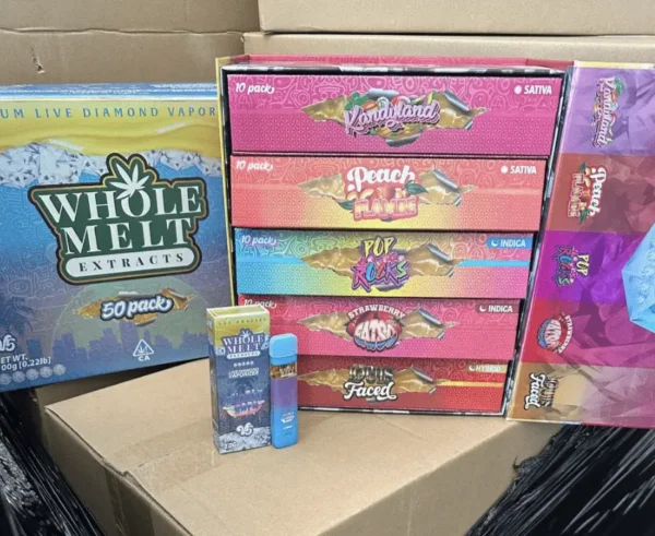 Whole Melts V5 Disposable Vape Cart premium cannabis vape with 10 different flavors including KandyLand and Peach Flambe, Strawberry Fatso